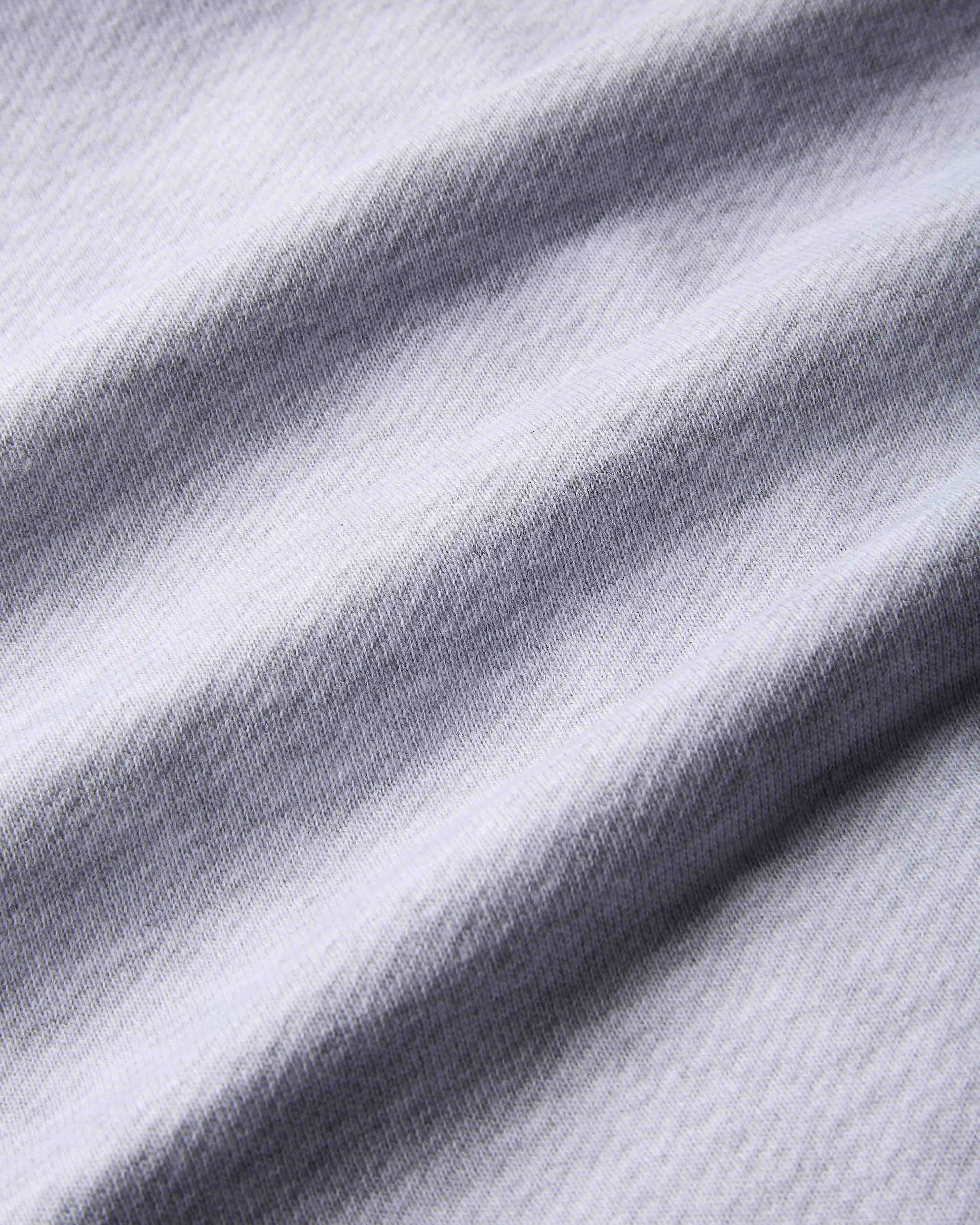 Close-up of gray fabric with a subtle pattern