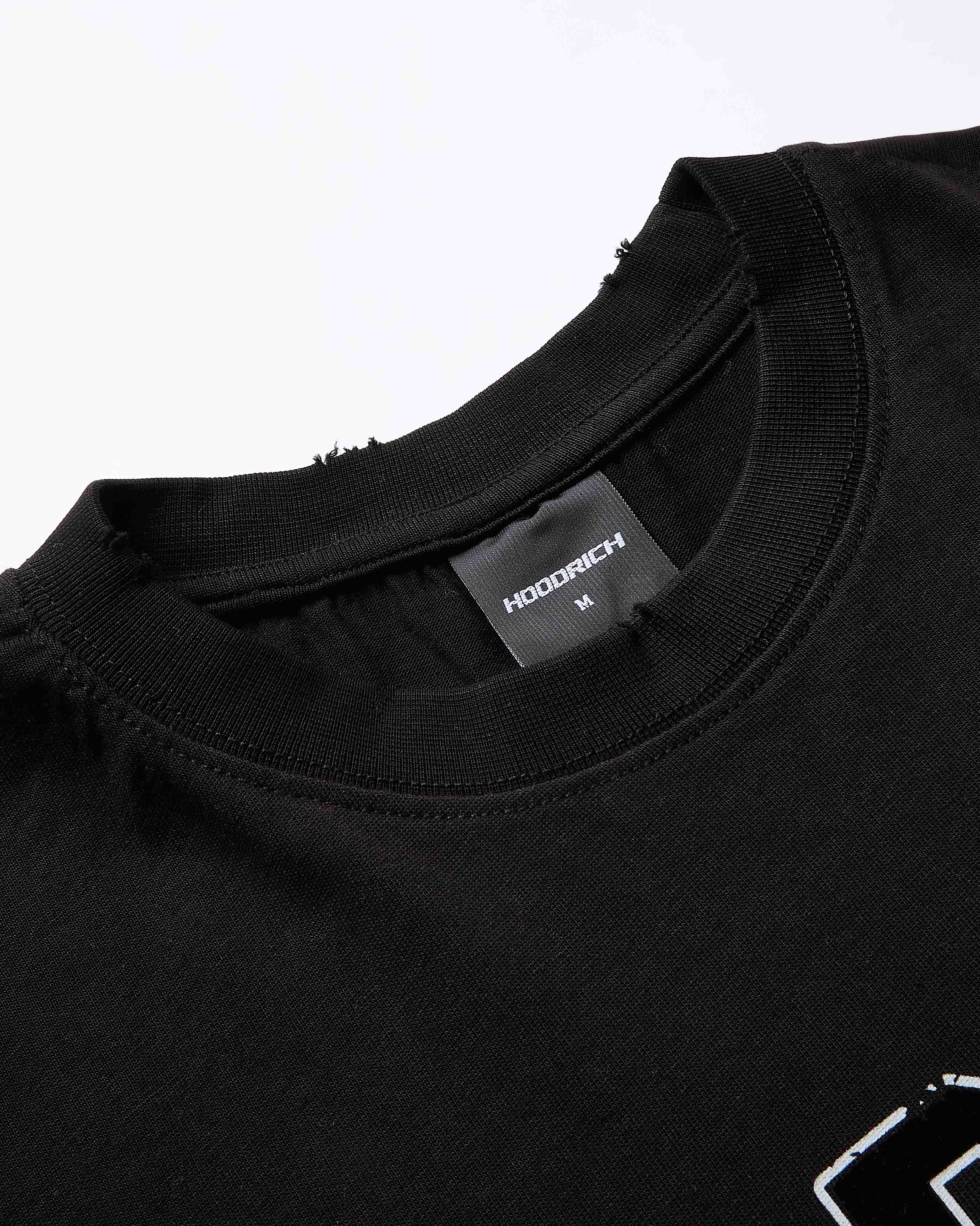 Black t-shirt with a visible brand label on a white background
