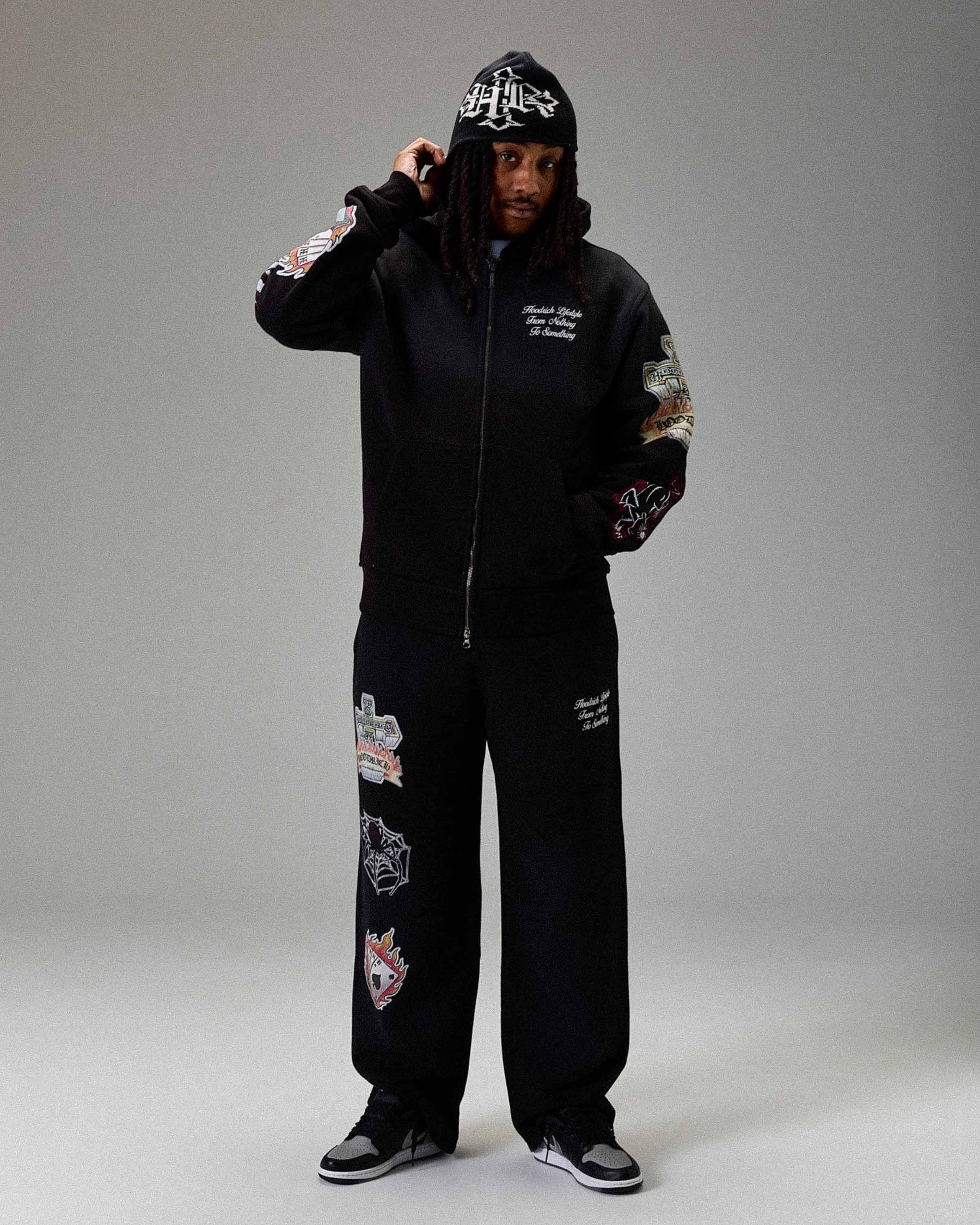 Pantaloni Jogger The Winner's Circle Phase Oversized con Orlo Aperto - Nero