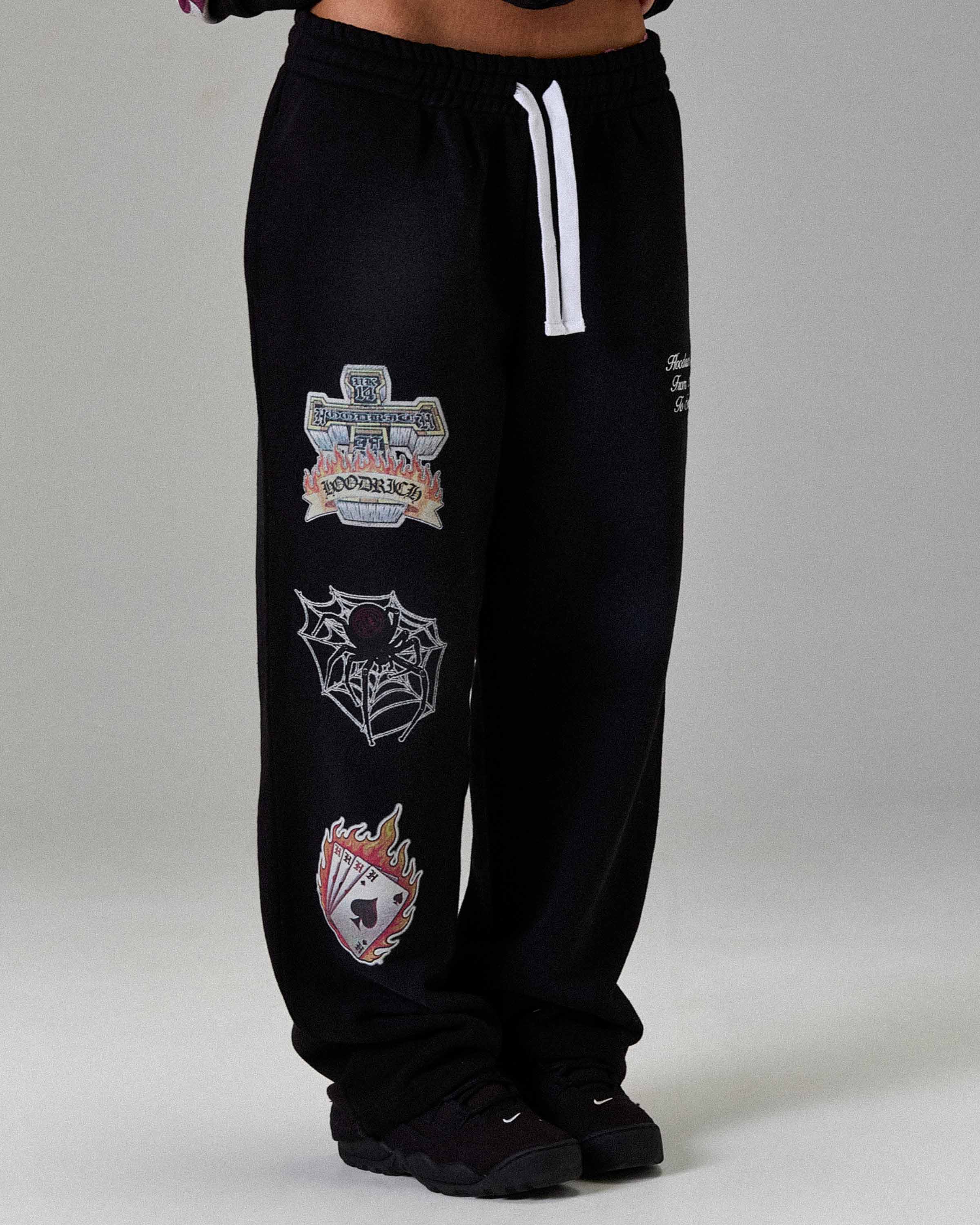 Pantaloni Jogger The Winner's Circle Phase Oversized con Orlo Aperto - Nero