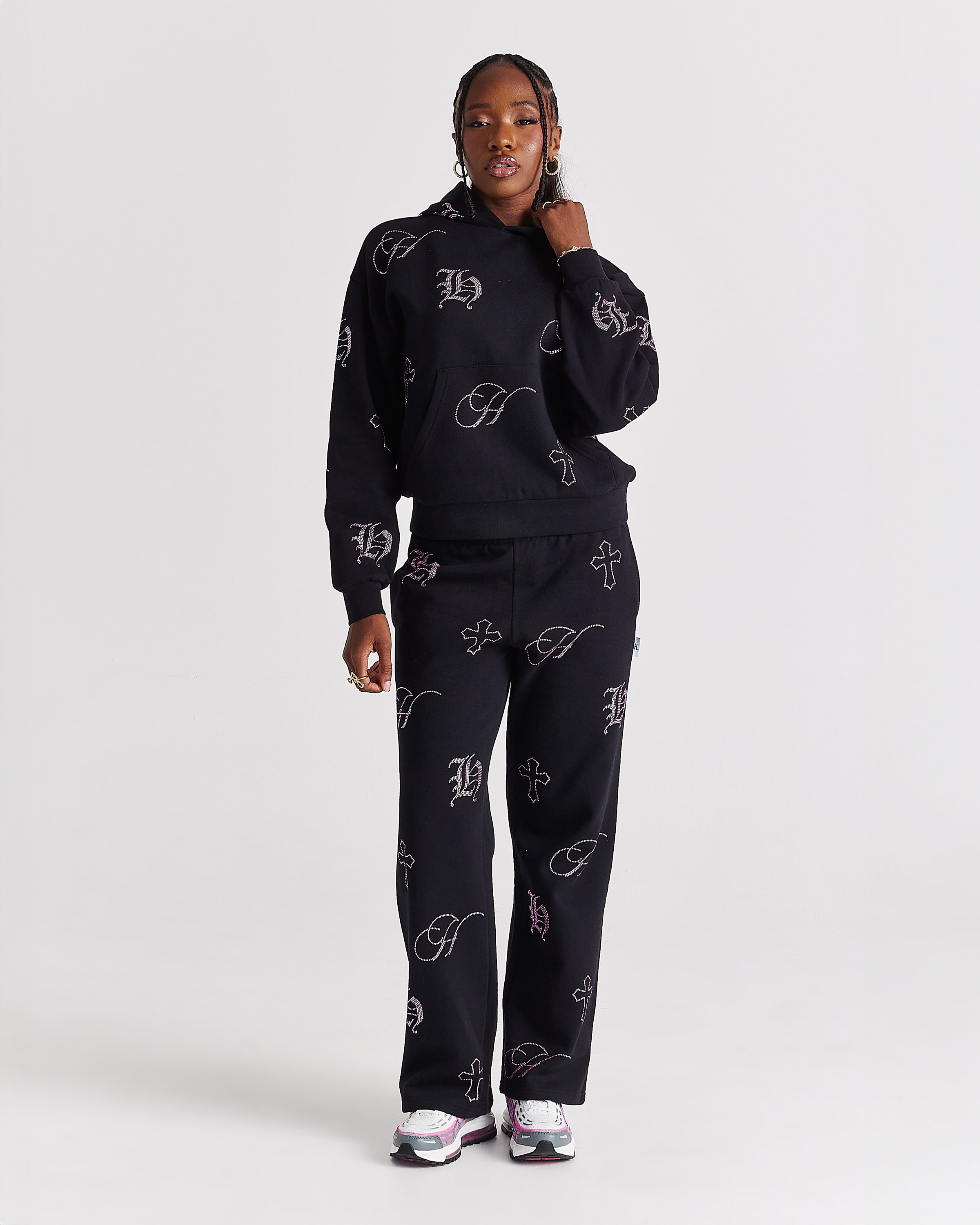 Pantaloni da jogging a gamba larga con cristalli - Nero/Strass rosa
