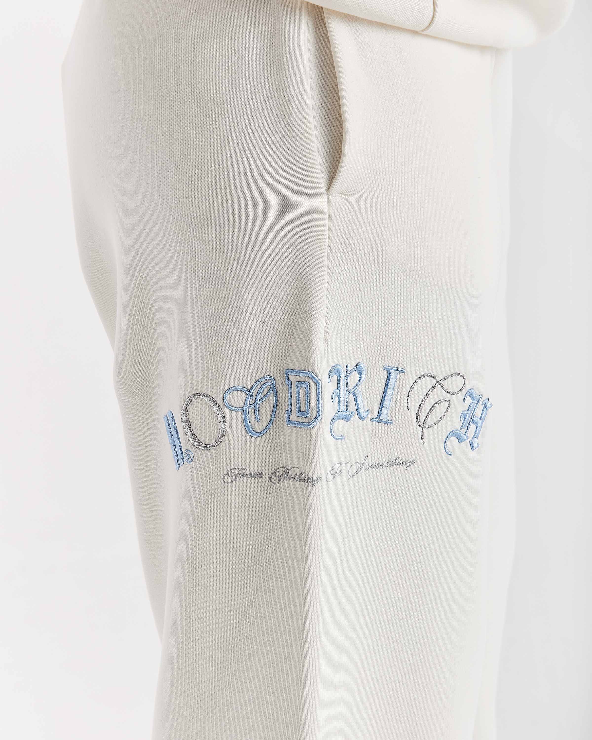 Pantaloni da jogging a gamba larga oversize Calor - Bianco sporco/Blu