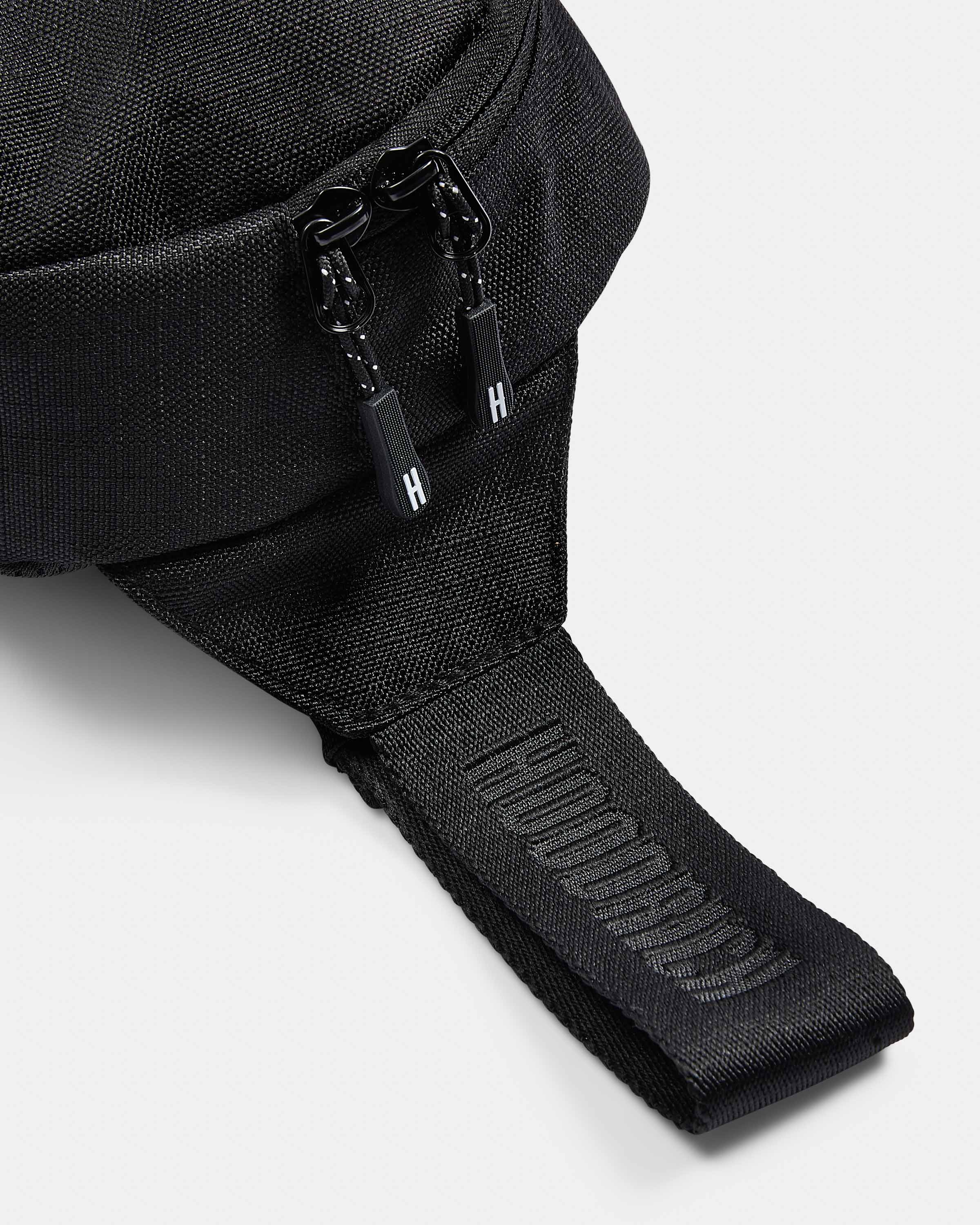 Borsello a tracolla Shade - Nero/Riflettente