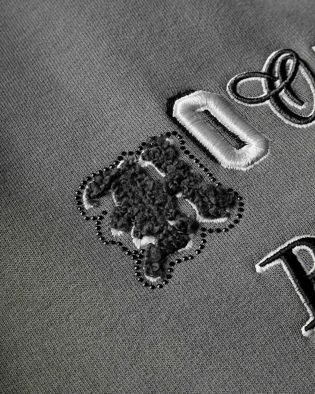 Displays the grey lava smoke 'Hoodrich' branded Forza Oversized Wide Leg Jogger featuring the hoodrich branding details