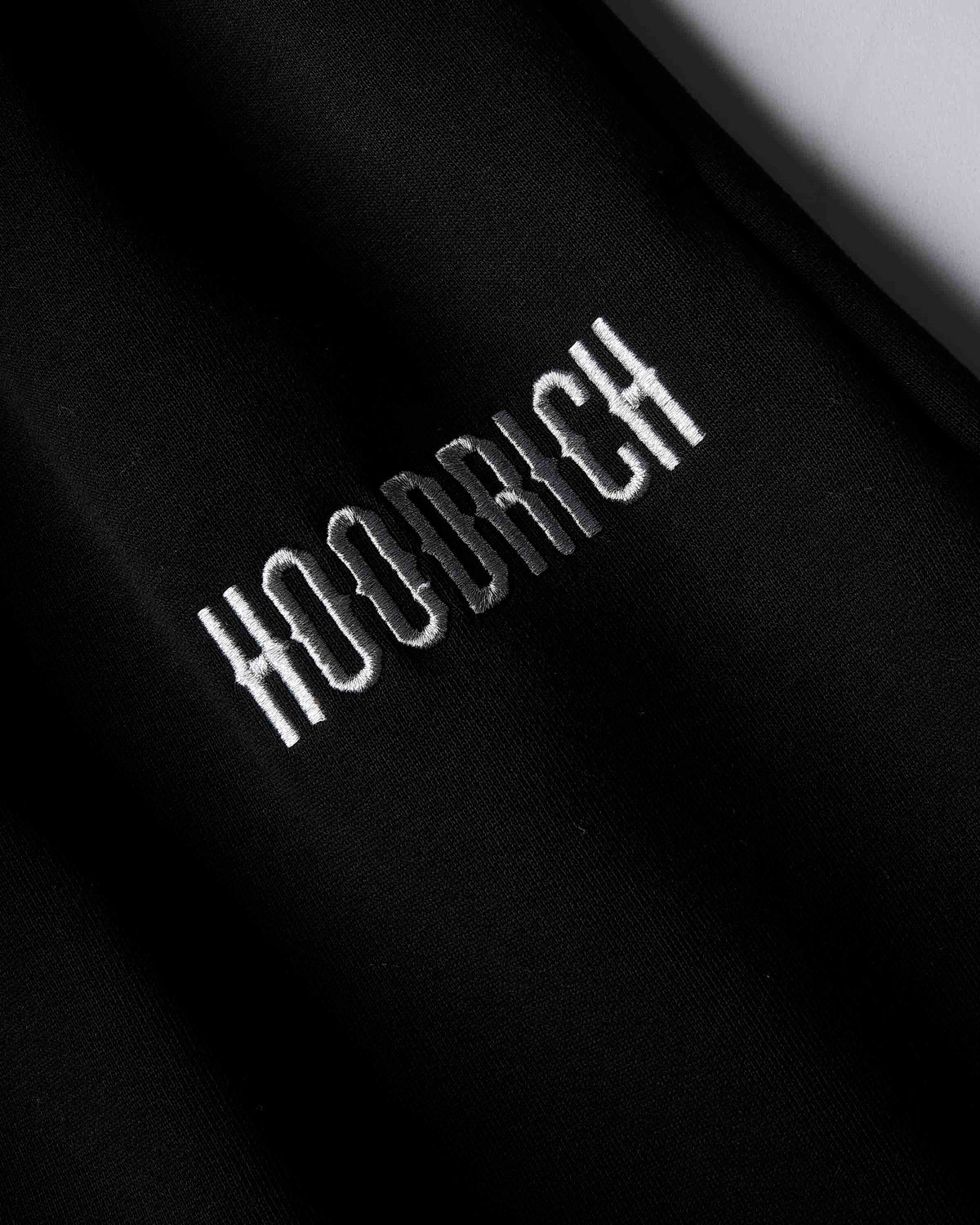 Displays the black 'Hoodrich' branded aSolace V2 Oversized Wide Leg Jogger 