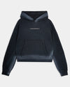 Oversized black Hoodrich hoodie featuring a kangaroo pocket and center chest logo.
