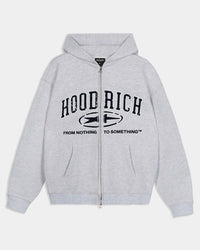 Relaxed grey marl zip-up hoodie featuring dark blue varsity-style Hoodrich branding and the slogan 'From Nothing To Something'