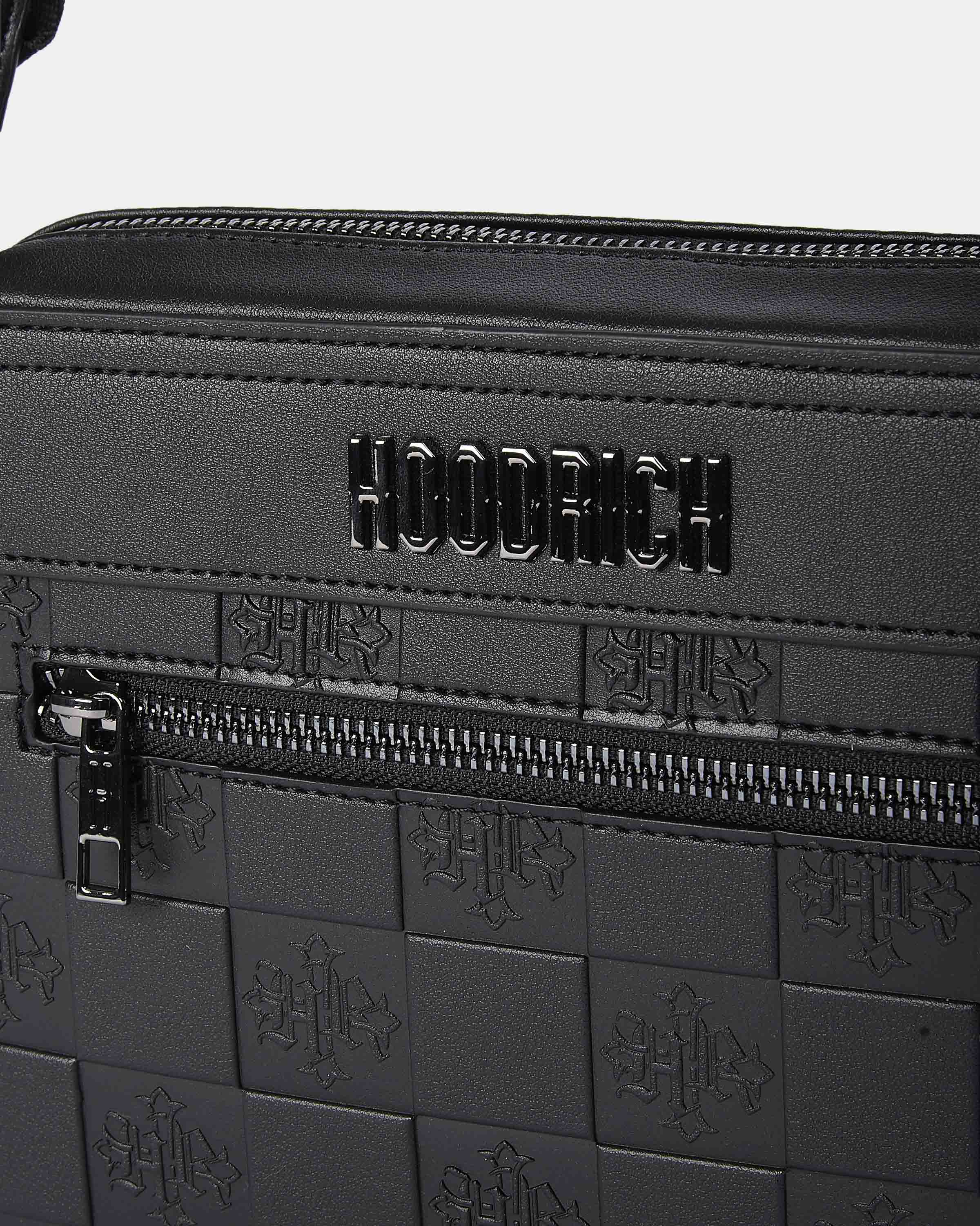 Black bag with 'HOODRICH' branding and embossed pattern on a white background