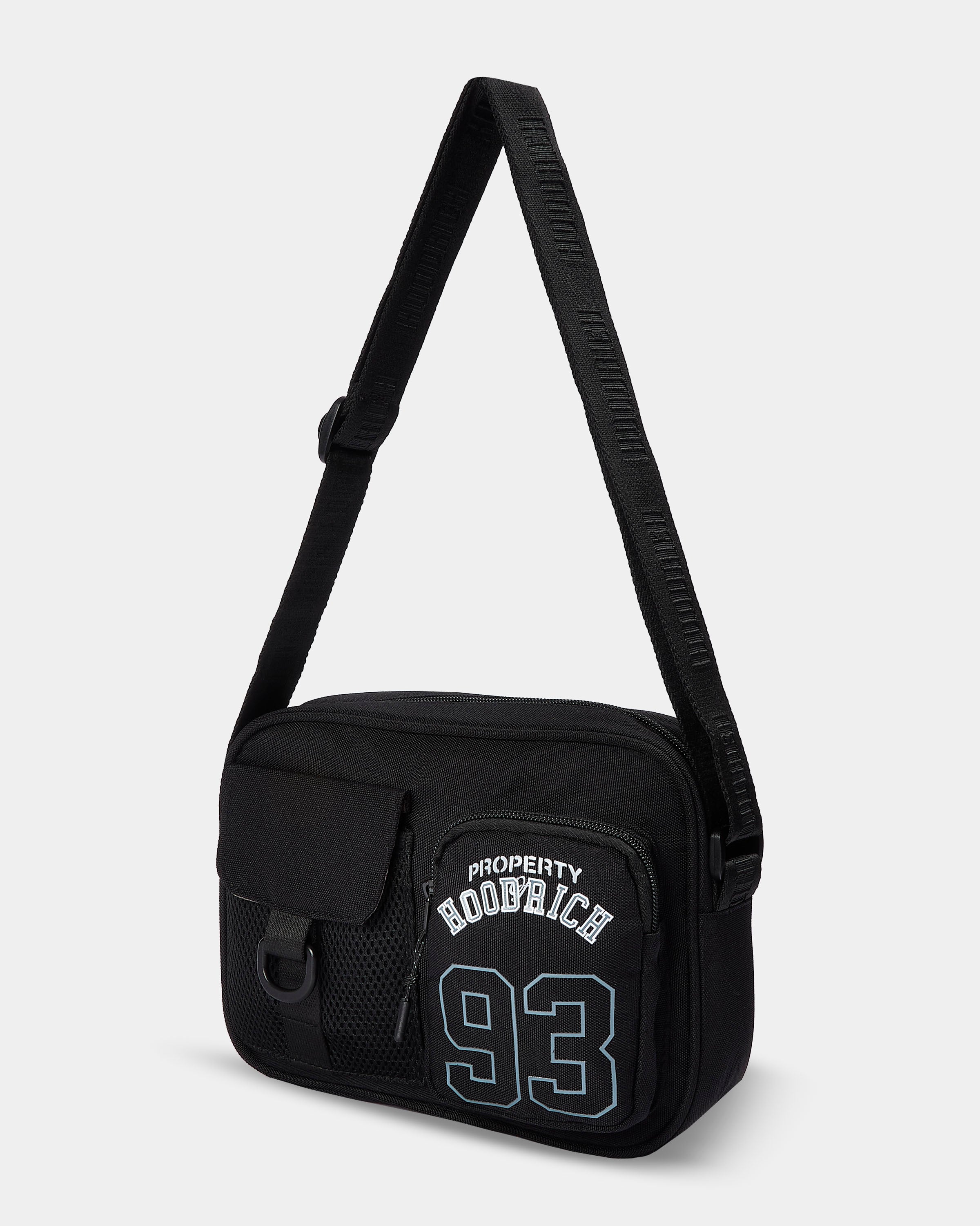 Black shoulder bag with text on a light gray background
