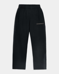 Black wide-leg joggers featuring a high-waisted elasticated waistband, side pockets, and an embroidered Hoodrich logo on the leg.