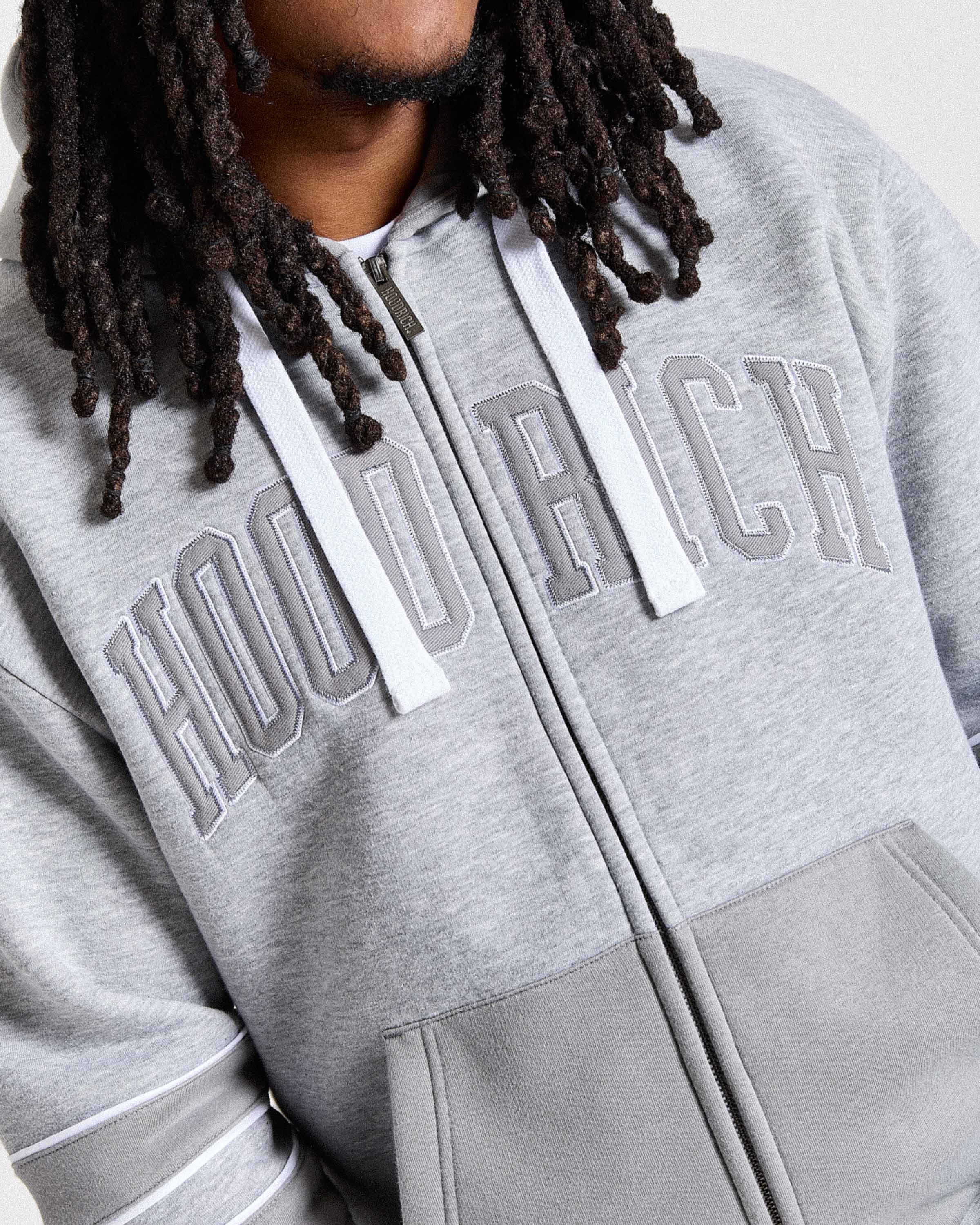 Gray hoodie with 'Hoodrich' branding on a white background