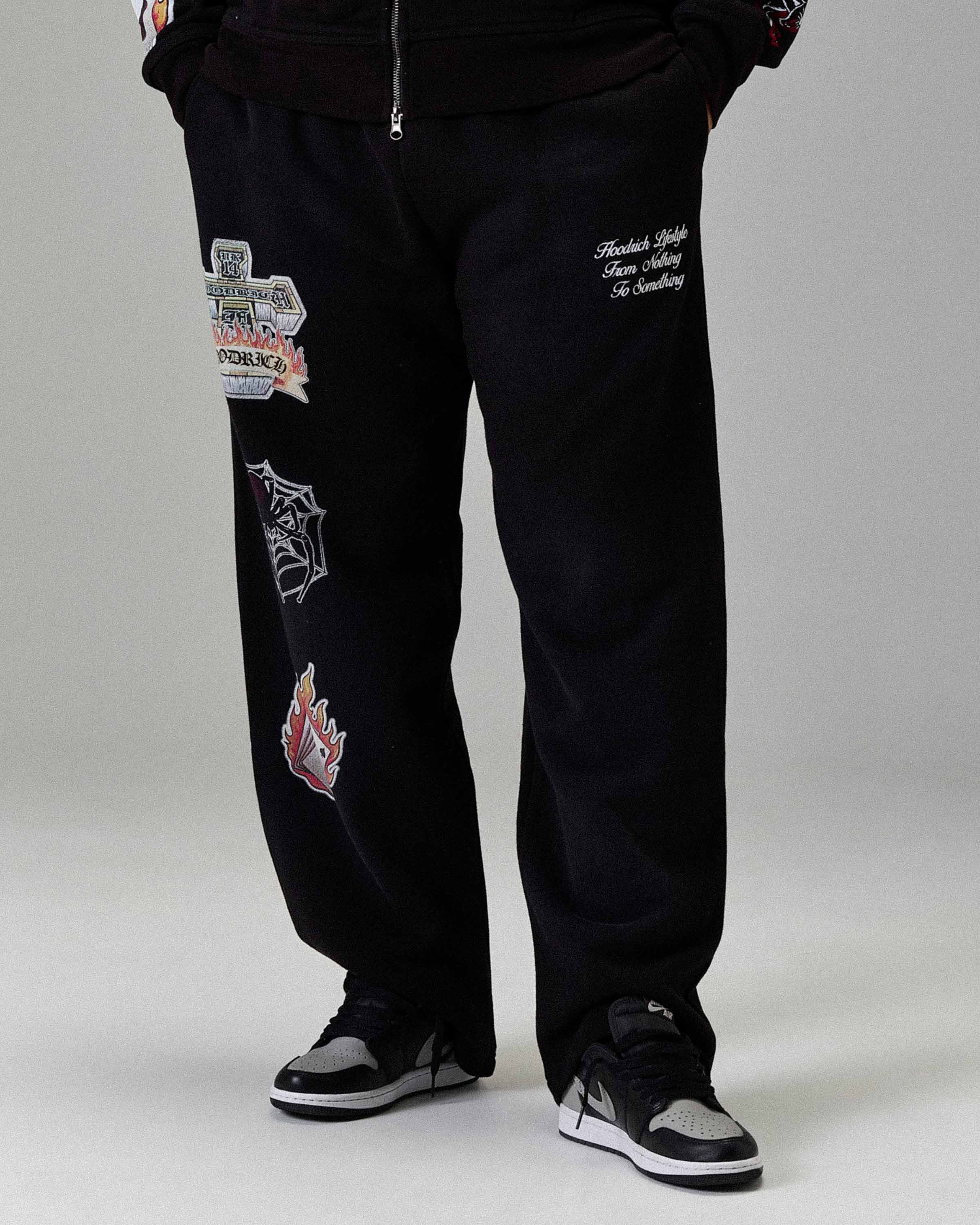 Jogger oversize con orlo aperto The Winner's Circle Phase - Nero
