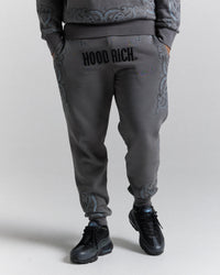 Jogger con motivo - Grigio scuro/Nero
