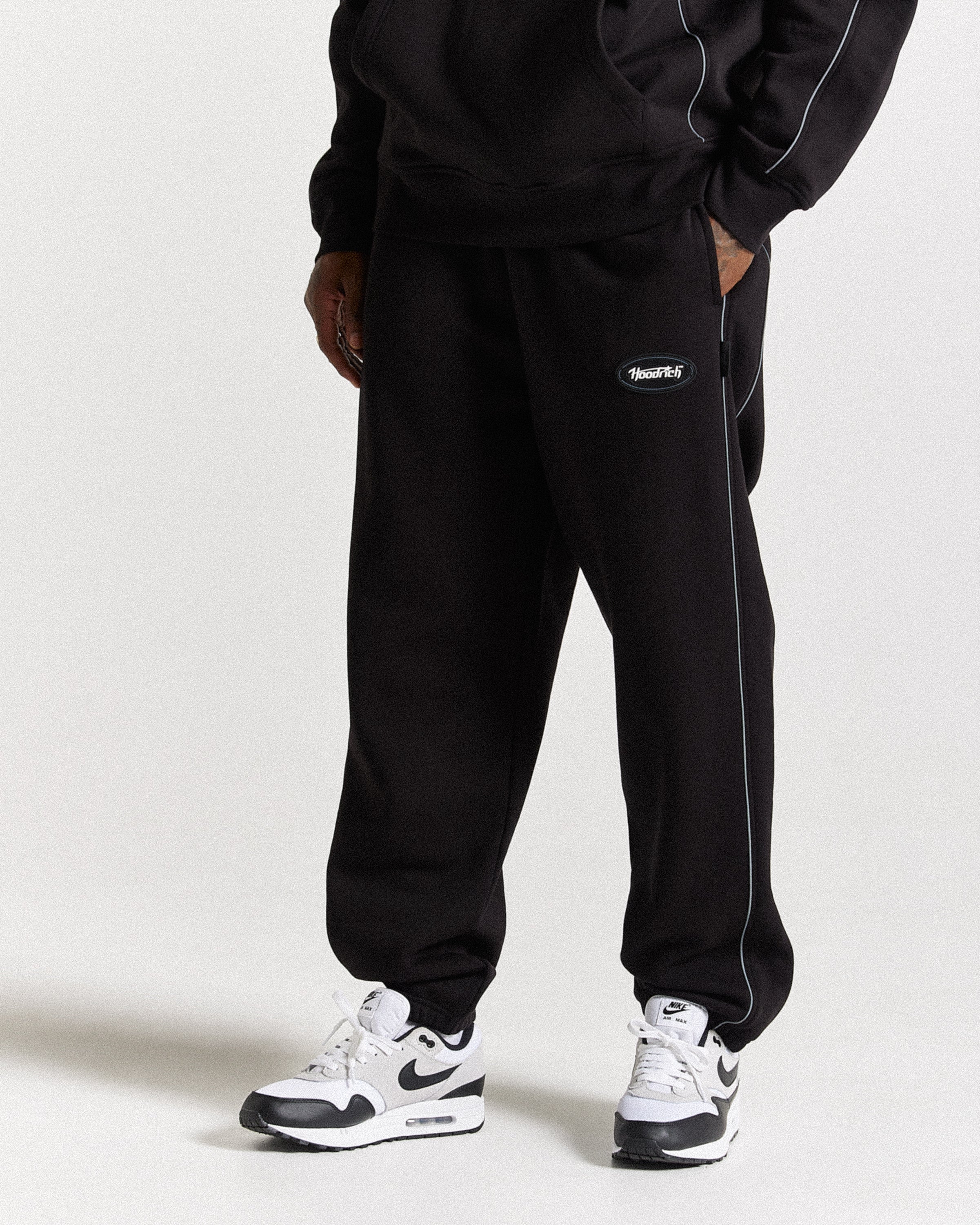 Jogger oversize Cypher - Nero/Riflettente