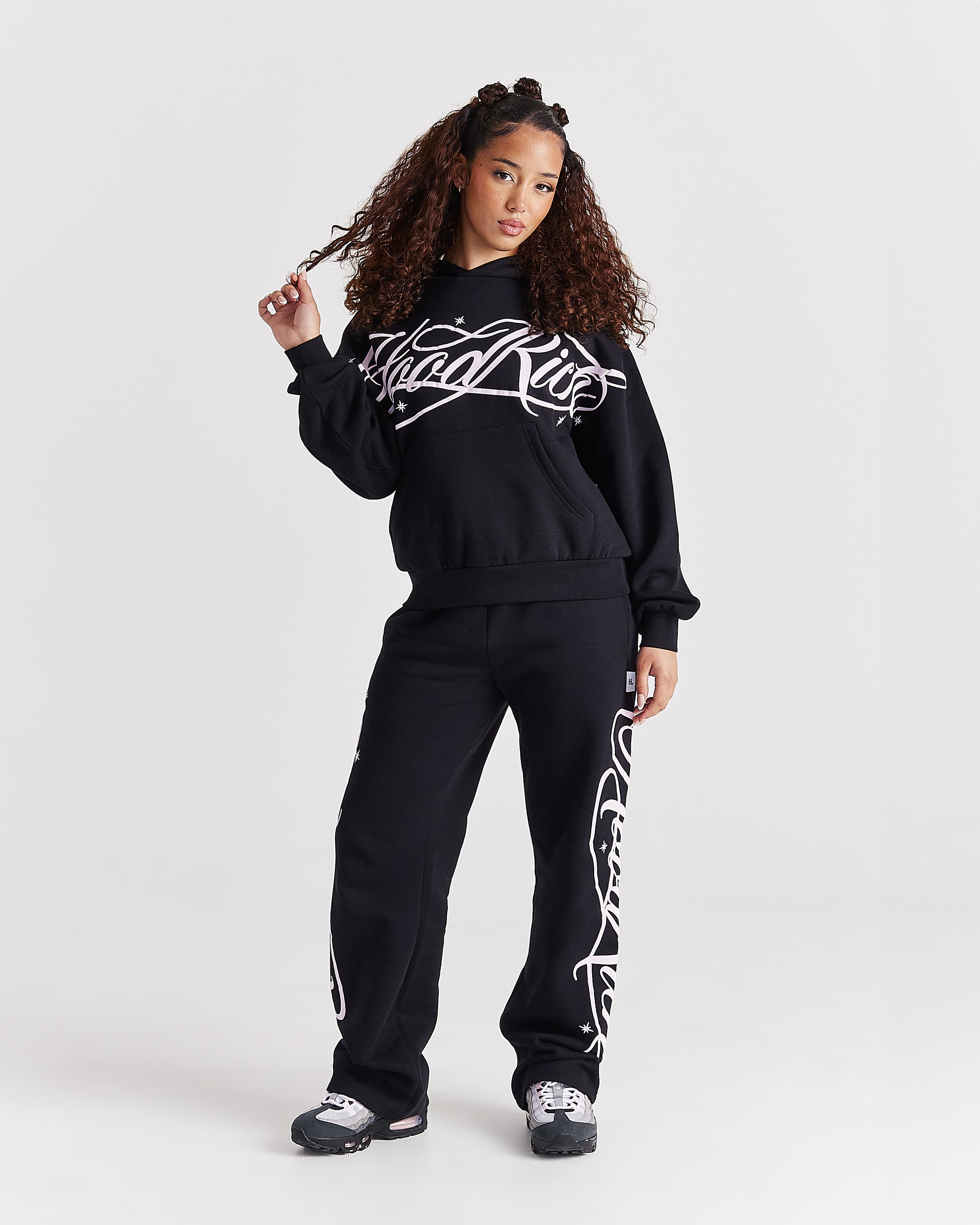Pantaloni da jogging a gamba larga Solace - Nero/Rosa