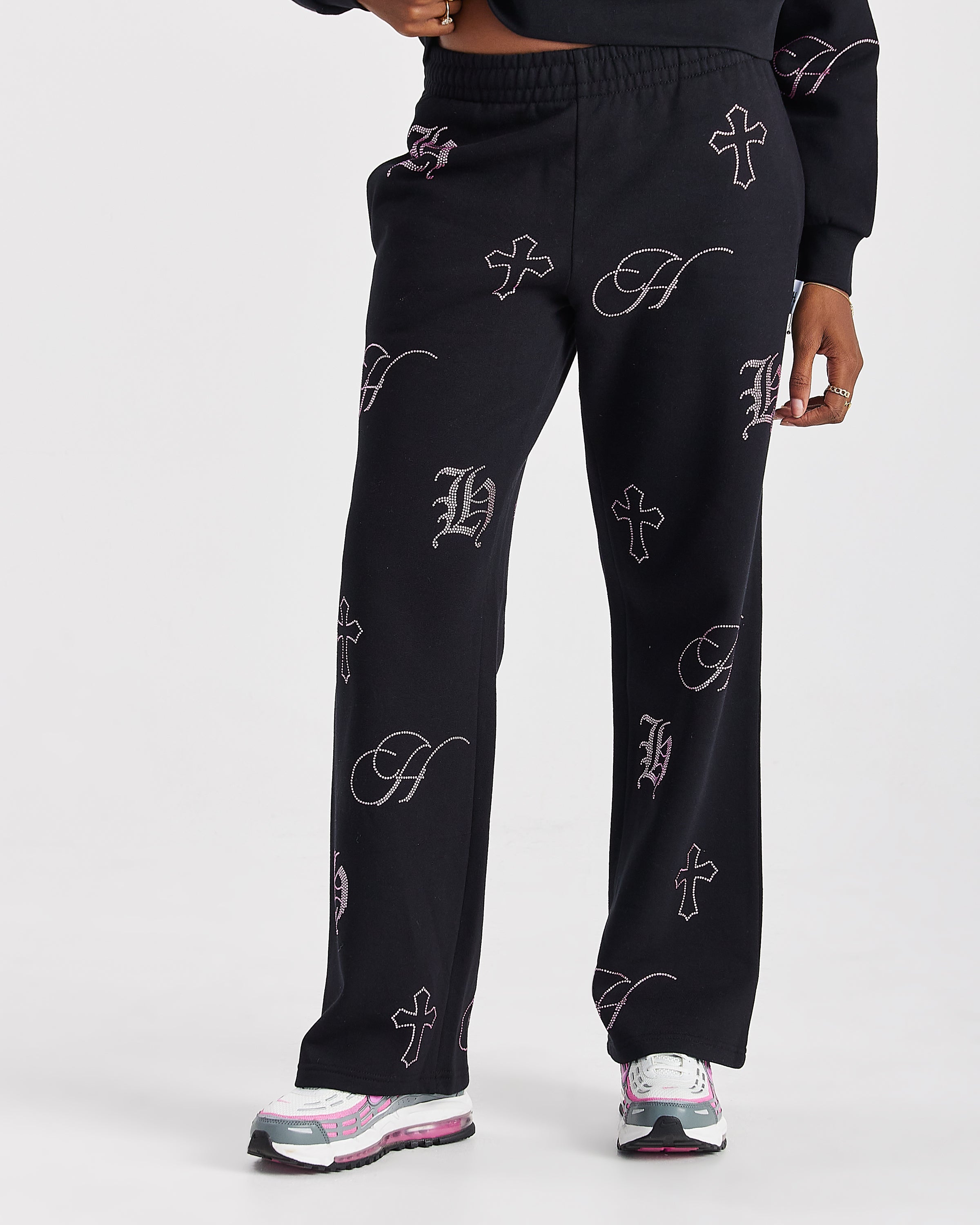 Pantaloni da jogging a gamba larga con cristalli - Nero/Strass rosa