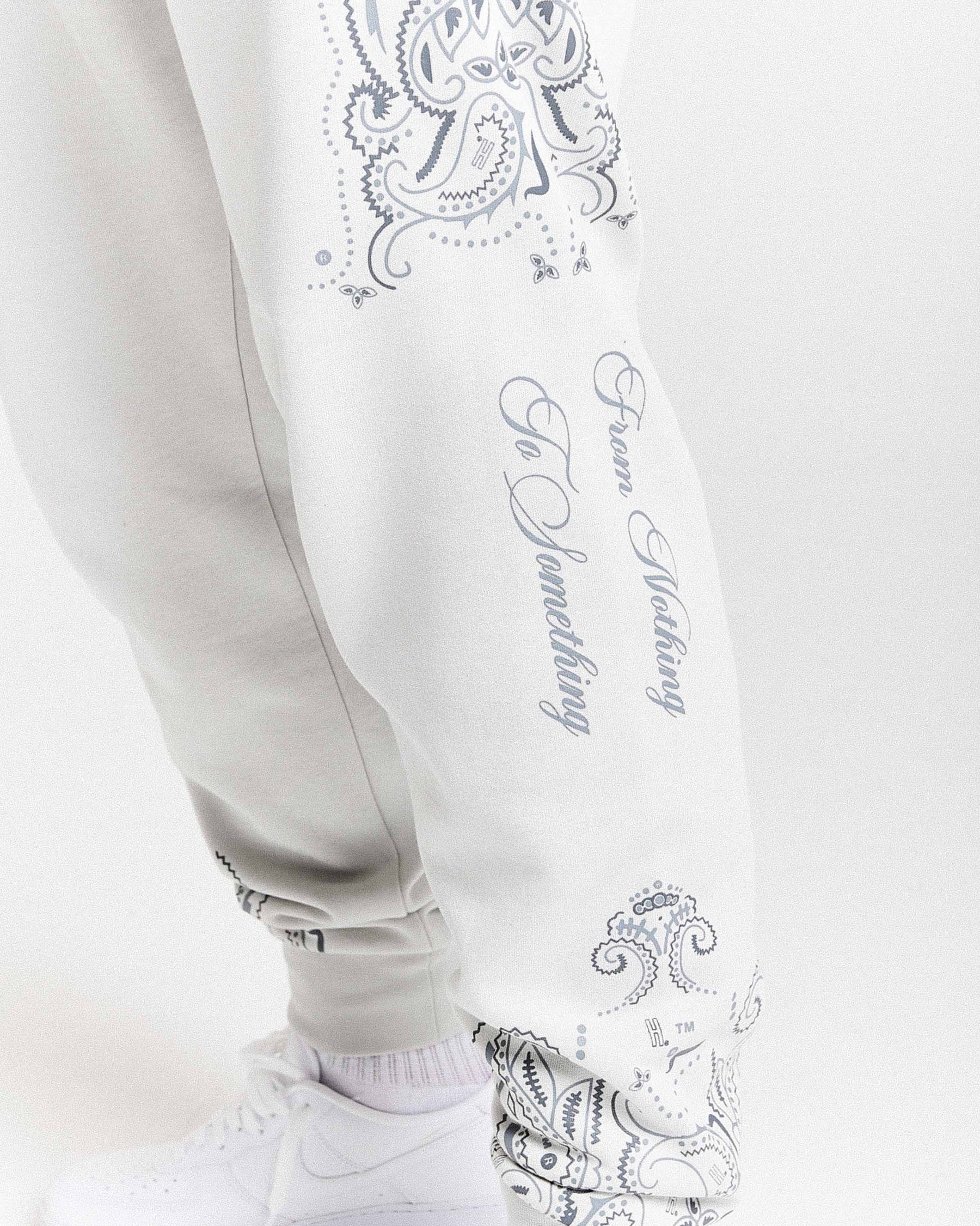 Pantaloni da jogging con motivo - Grigio chiaro/Nero