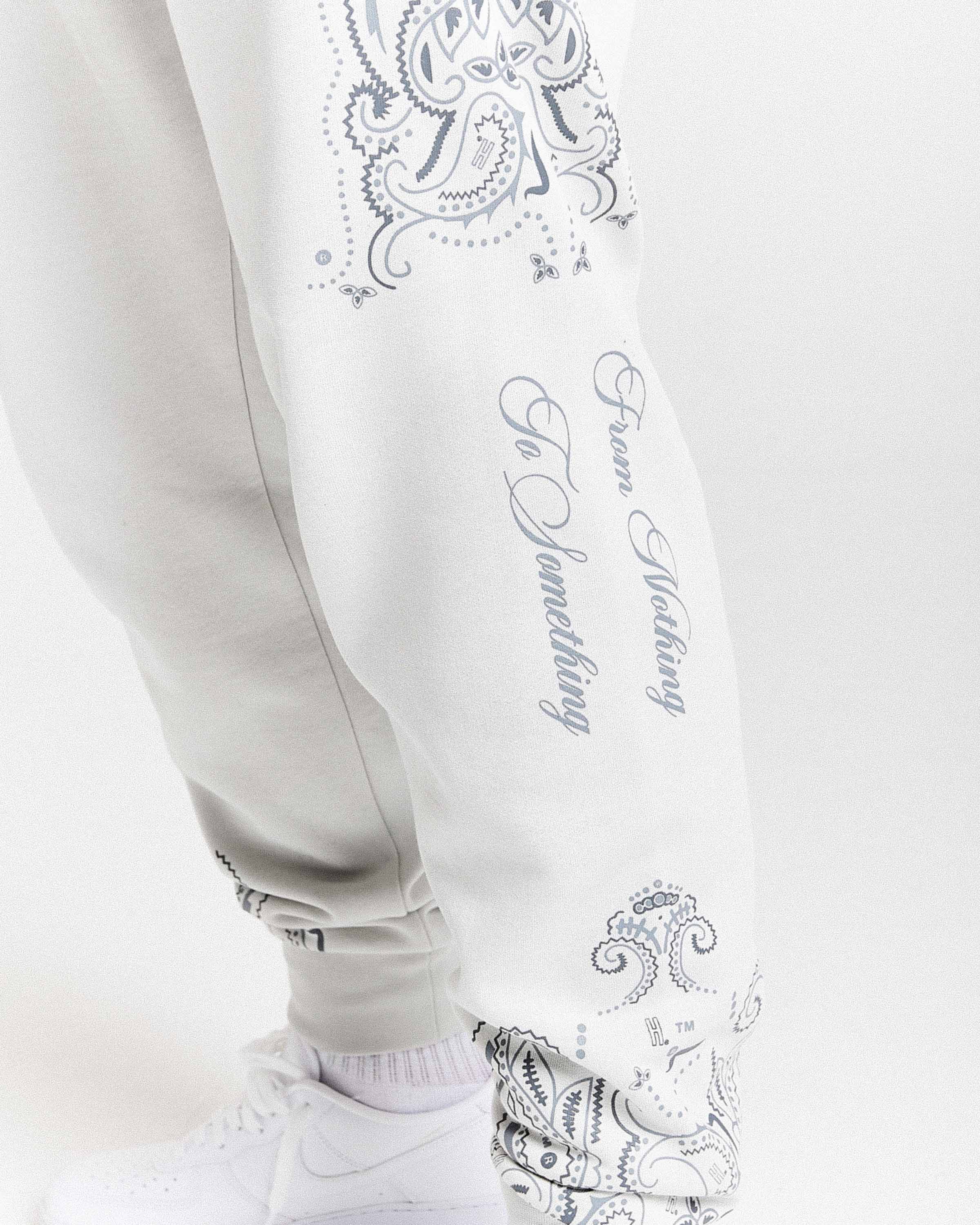 Pantaloni da jogging con motivo - Grigio chiaro/Nero