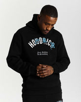 Person wearing a black hoodie with text and graphics on a white background